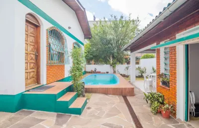 Casa em condomínio fechado com 3 quartos à venda na rua congo, 110, vila ipiranga, porto alegre por r$ 1.100.000