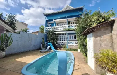 Casa em condomínio fechado com 3 quartos à venda na rua itapema, 156, vila jardim, porto alegre por r$ 1.005.000