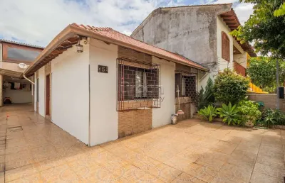 Casa em condomínio fechado com 3 quartos à venda na rua breno arruda, 151, santa maria goretti, porto alegre por r$ 530.000