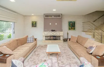 Casa em condomínio fechado com 4 quartos à venda na rua doutor jorge fayet, 693, chácara das pedras, porto alegre por r$ 2.995.000