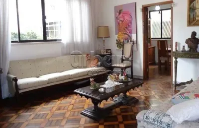 Casa em condomínio fechado com 3 quartos à venda na rua eudoro berlink, 204, auxiliadora, porto alegre por r$ 1.250.000