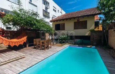 Casa com 3 quartos à venda na rua fagundes varela, 158, santo antônio, porto alegre por r$ 1.200.000