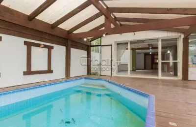 Casa em condomínio fechado com 4 quartos à venda na rua indianápolis, 240, três figueiras, porto alegre por r$ 1.780.000