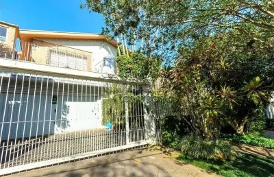 Casa com 4 quartos à venda na rua doutor barbosa gonçalves, 261, chácara das pedras, porto alegre por r$ 1.590.000