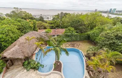 Casa com 5 quartos à venda na rua bororó, 301, vila assunção, porto alegre por r$ 4.000.000