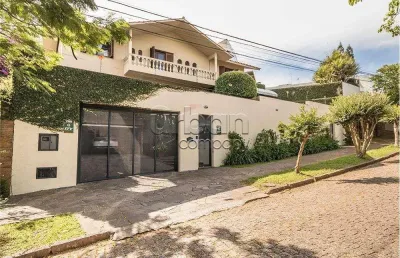 Casa em condomínio fechado com 4 quartos à venda na rua felipe becker, 357, três figueiras, porto alegre por r$ 4.150.000