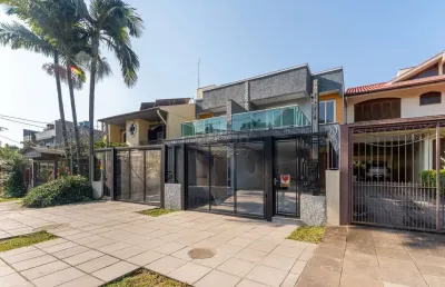 Casa em condomínio fechado com 3 quartos à venda na avenida josé gertum, 570, chácara das pedras, porto alegre por r$ 1.280.000
