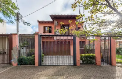 Casa em condomínio fechado com 3 quartos à venda na rua fernando cortez, 413, cristo redentor, porto alegre por r$ 1.050.000