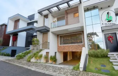 Casa com 3 suítes, espaço gourmet com churrasqueira com 321,00m² no condomínio boulevard previllege no uberaba