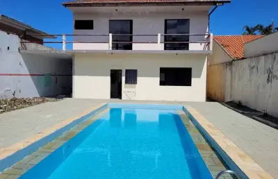 Casa ampla com terreno excelente no centro de guaratuba a poucas quadras da praia central