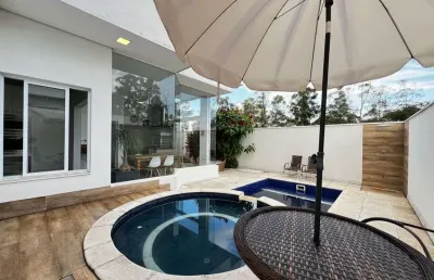 Casa alto padrão com 3 suítes e piscina no condomínio central parque em salto/sp