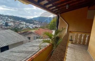 Linda casa bairro quisisana com area gourmet e terreno grande