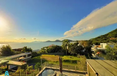 Casa em condomínio fechado com 4 quartos à venda no cacupé, florianópolis  por r$ 6.900.000