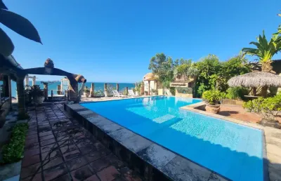 Espetacular casa duplex mobiliada na praia do pacheco – 7 suítes, piscina e 1.000m² de terreno!