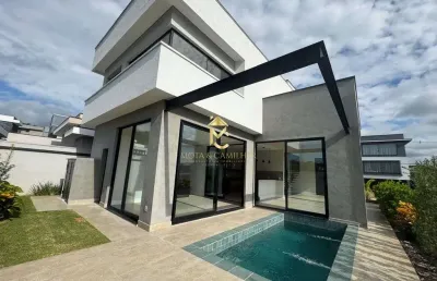 Casa com 4 suítes e piscina à venda no condomínio cyrela .