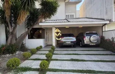 Casa com 4 suítes e piscina no condomínio fortaleza