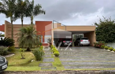 Luxuosa casa de 5 suítes no condomínio village ipanema 1 em araçoiaba da serra-sp: 400m², 2 salas, 7 banheiros e 16 vagas.