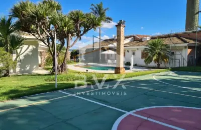 Casa térrea no condomínio chácaras resid. santa maria, 957,19 m², 3 suítes (1 master c/ closet e banheira), home theater, varanda gourmet, piscina