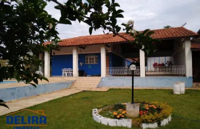 Linda chácara a venda, bem localizada em terra preta!