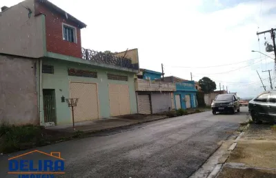 Casa a venda em terra preta com quintal e 2 dormitórios.