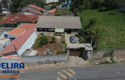 Casa a venda com 2 dormitórios em bairro tranquilo na terra preta.