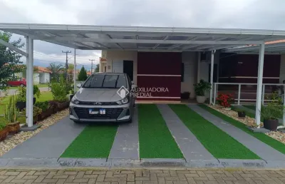 Casa em condomínio fechado com 4 quartos à venda na avenida paulo roberto vidal, 1455, bela vista, palhoça, 87 m2 por r$ 617.000