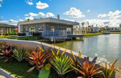 Terreno em condomínio fechado à venda na avenida deltaville, 360, beira rio, biguaçu, 150 m2 por r$ 218.000