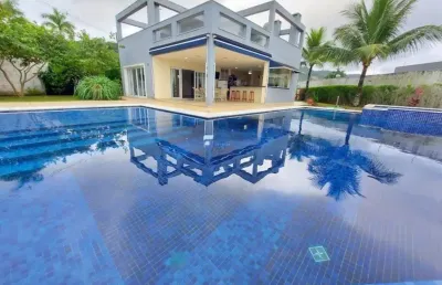 Linda casa, com 6 suítes, 560 m² de área construída, piscina, enseada