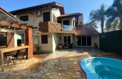 Casa à venda em são leopoldo, bairro pinheiro - com sacada, churrasqueira e piscina