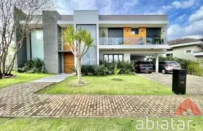 Casa de 4 dormitórios com 634m² com vaga para 4 carros - granja viana