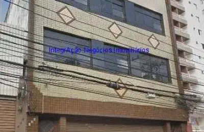 Prédio comercial 980m², térreo com 408m², salão livre, 02 wc masculino e 2 bwc feminino; 1º pavimento 392m²,  salão livre,  02 wc masculino.