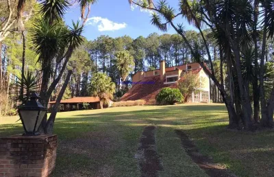 Terreno com 140.000m² à 1km da represa e a margem da rodovia com casa sobrado suiça 600m², 04 dormitórios (sendo 02 suítes), 03 banheiros