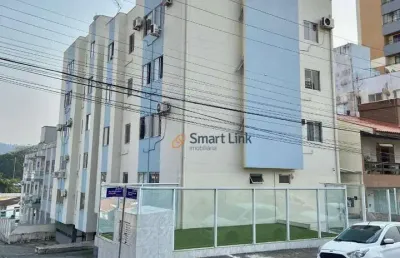 Apartamento com 2 dormitórios à venda, 58 m² por r$ 310.000,00 - barreiros - são josé/sc