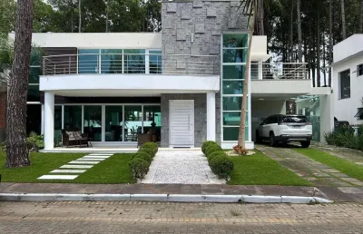 Casa em condomínio para venda no bairro praia de atlântida em xangri-lá