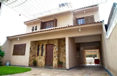Casa com 3 quartos à venda na Rua Princesa Isabel, Sumaré, Alvorada