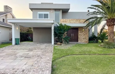 Casa em condomínio para venda no bairro centro em xangri-lá