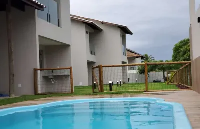 Village novo próximo a praia, dois dormitórios  suites, 70m² com 20m²de área gourmet, nascente a 15