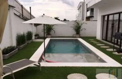 Linda casa de condomínio para venda com 440 metros com 4 suites .