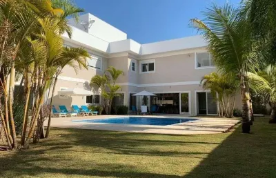 Maravilhosa casa de esquina para venda em condomínio clube, com 1000 metros de terreno e 6 suítes