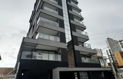 Oportunidade apartamento no centro de balneario piçarras com tres quartos sendo uma suite