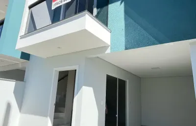 Sobrado a 400 metros da praia com tres quartos sendo uma suite