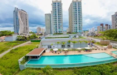 Apartamento frente mar com 4 dormitorios semi mobiliado pé na areia