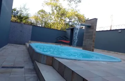 Linda casa com piscina próximo a praia do massaguaçu- caraguatatuba-sp