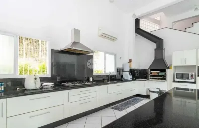 Casa em condomínio fechado com 6 quartos à venda na Rodovia Admar Gonzaga, 3937, Lagoa da Conceição, Florianópolis