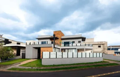 Casa com 4 dormitórios à venda, 260 m² por r$ 1.850.000,00 - condomínio residencial terras do cancioneiro - paulínia/sp