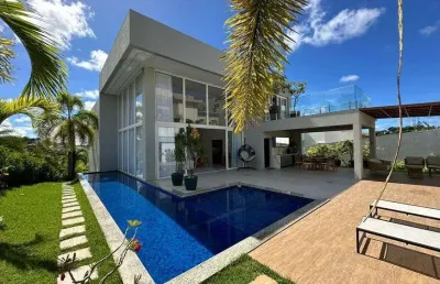 Casa em alphaville litoral norte i com 4|4, 04g e 549m²