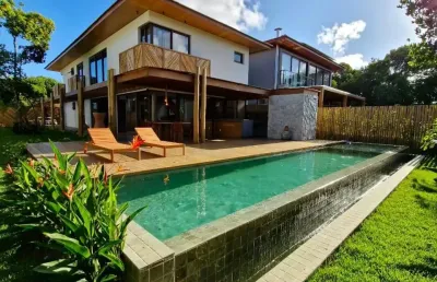 Casa de alto padrão com 5 suítes à venda, porteira fechada, no condomínio praia bella com acesso privativo à praia, localizado na praia do forte - bahia -