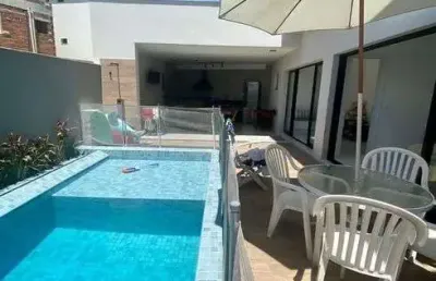 Casa de condomínio para venda tem 370 metros quadrados com 5 quartos