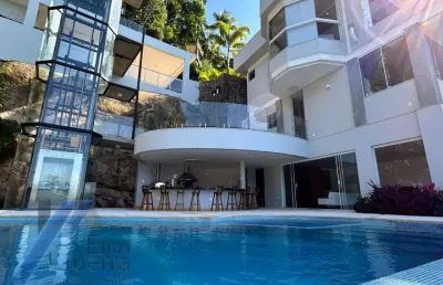 Ubatuba, praia vermelha do sul - casa alto padrão, com terreno de 5.000 m2, com 04 suites e vista para o mar.