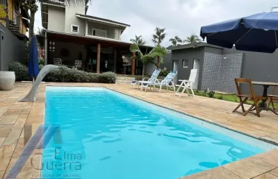Ubatuba, condominio villas - belíssima casa com 03 suítes e área de lazer.